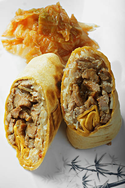 istock Burrito with grilled beef and kimchi closeup 610878944
