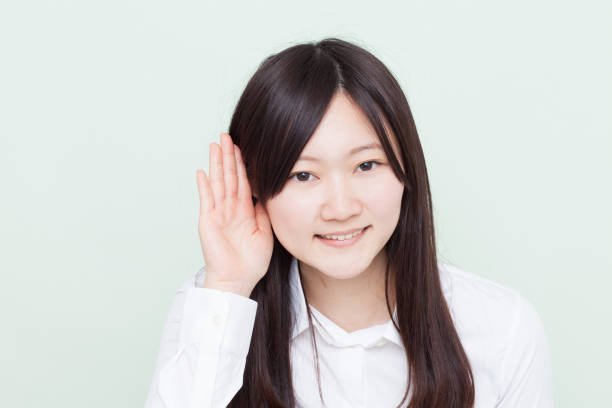 istock Japanese woman making gestures 610880382