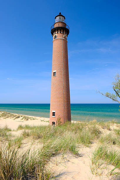 istock Little Sable Point Lighthouse in dunes, built in 1867 610881744