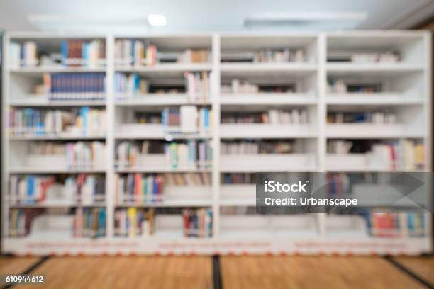 Blurred Background Of Public Library Bookshelf With Books Education Concept Stock Photo - Download Image Now