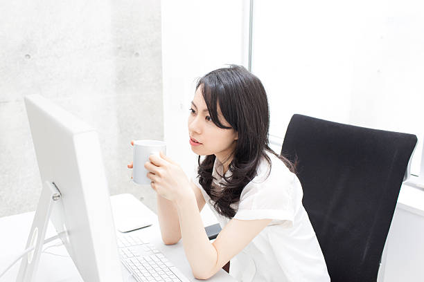 istock Japanese business woman having a breaktime 610946654