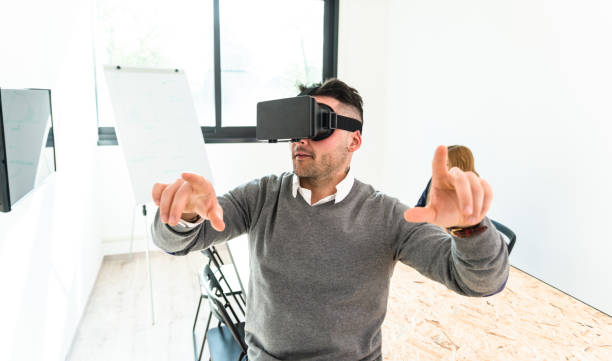 man entartains his self with virtual reality device simulator