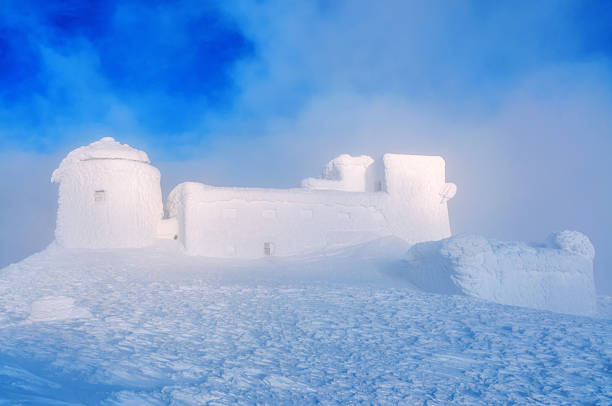 abandoned snow-covered observatory on the mountain Pip Ivan, called White Elephant in the Carpathian mountains.Winter time