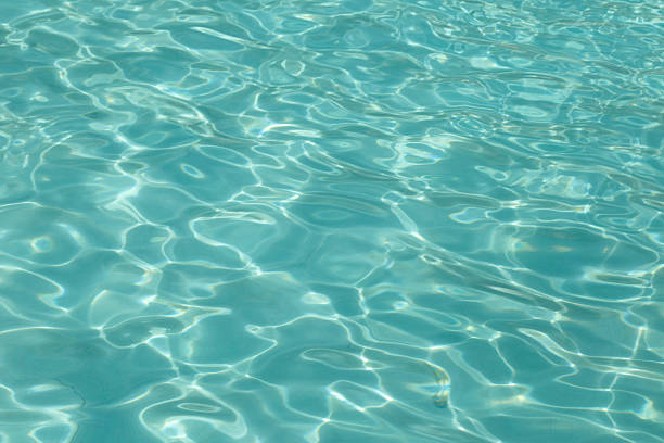 istock Crystal clear water of Agios Thomas beach 610951236