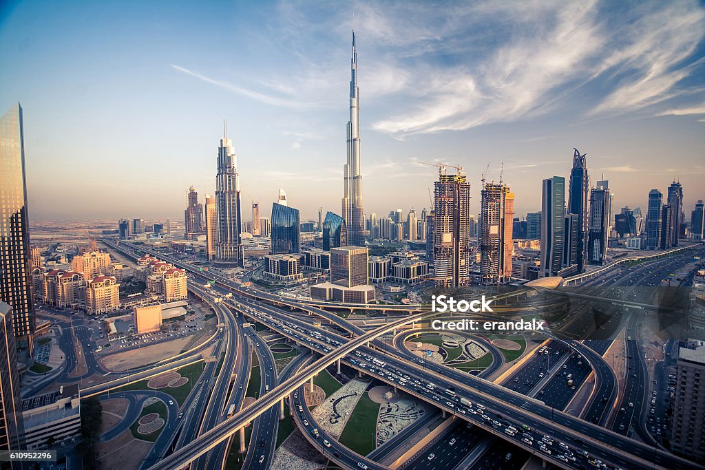 Dubai skyline with beautiful city background Dubai skyline with beautiful city close to it's busiest highway on traffic. Highway from Sarjah to Abudabi. United Arab Emirates Stock Photo