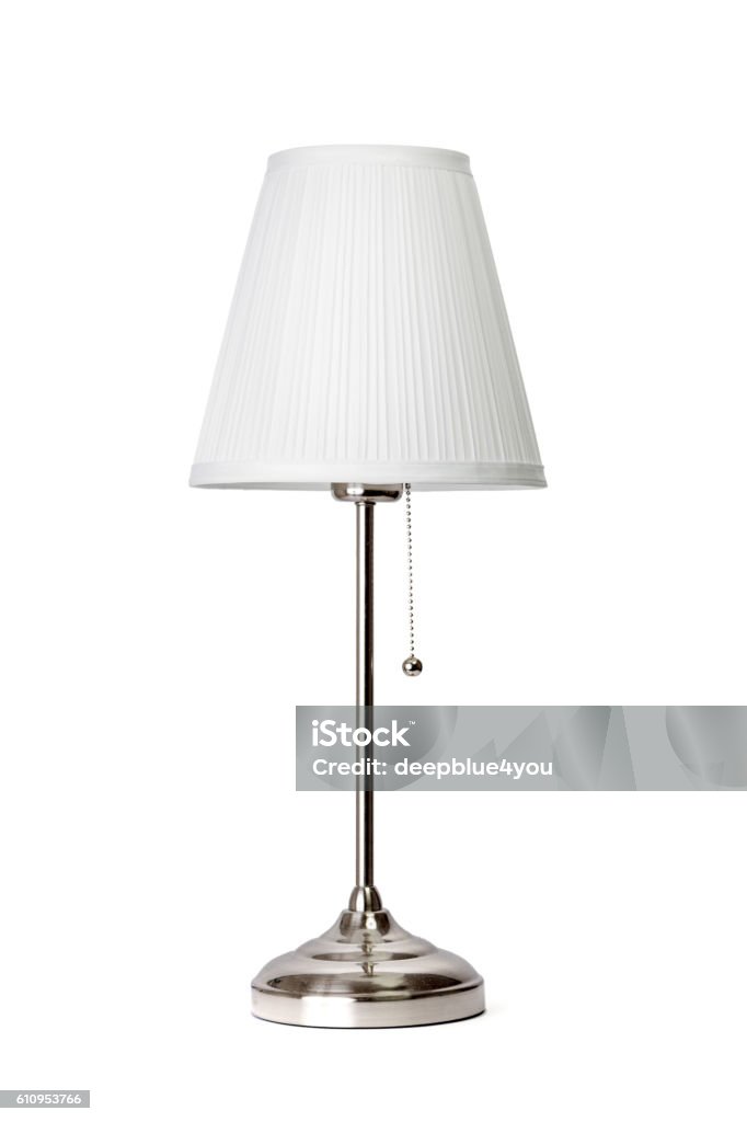 Small metall table lamp with white lampshade isolated Electric Lamp Stock Photo
