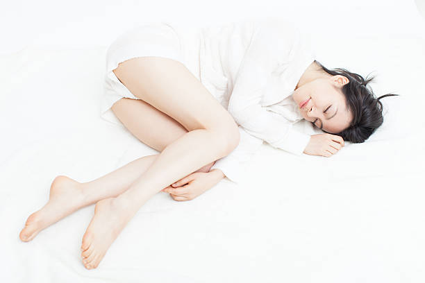 Japanese woman sleeping in the bed