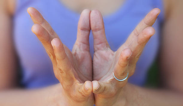 Flower Mudra Hands Hands in a Flower Yoga Mudra mudra stock pictures, royalty-free photos & images