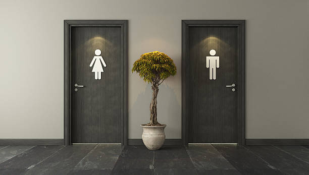 istock black restroom doors for male and female 610956746