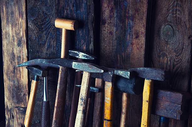 istock Many old hammers in carpenter's workshop 610957316