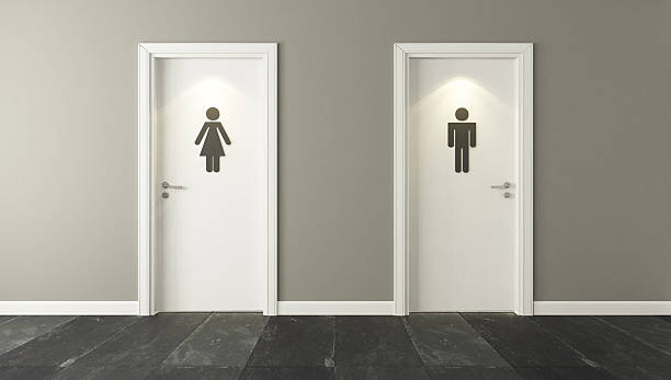 男性と女性のための白いトイレのドア - public restroom bathroom restroom sign sign ストックフォトと画像