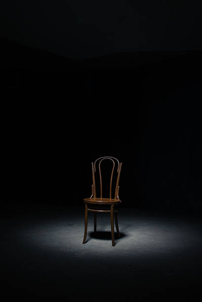 istock Lonely chair at the empty room 610958414