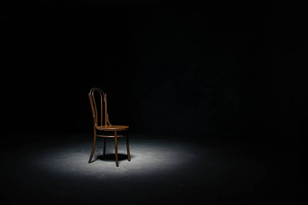 istock Lonely chair at the empty room 610958470