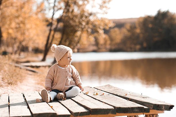 istock Child girl resting in park 610958752