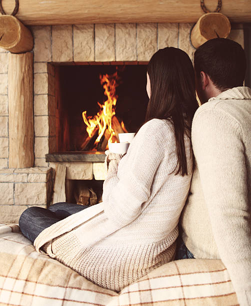 istock Couple holding cups with hot chocolate 610959944