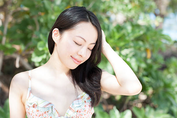 istock Japanese woman wearing bikini on the beach 610961030