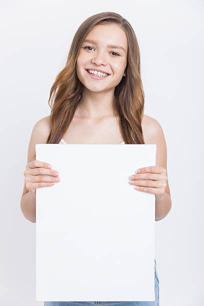 istock Girl promoting services and products 610961052