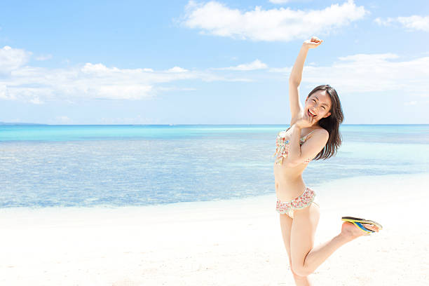 Japanese woman wearing bikini on the beach