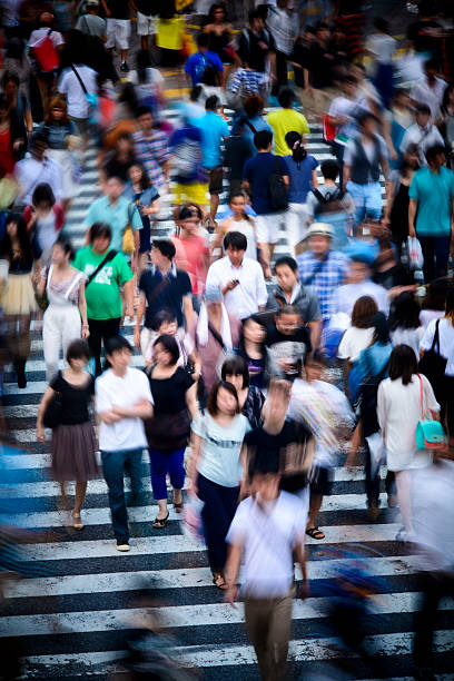 istock Tokyo crowd in motion at Shibuya Crossing 610962570