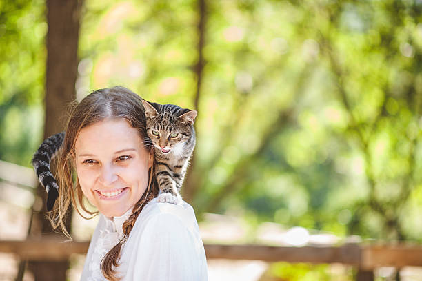 istock Happy Young Woman and her Cat 610963066