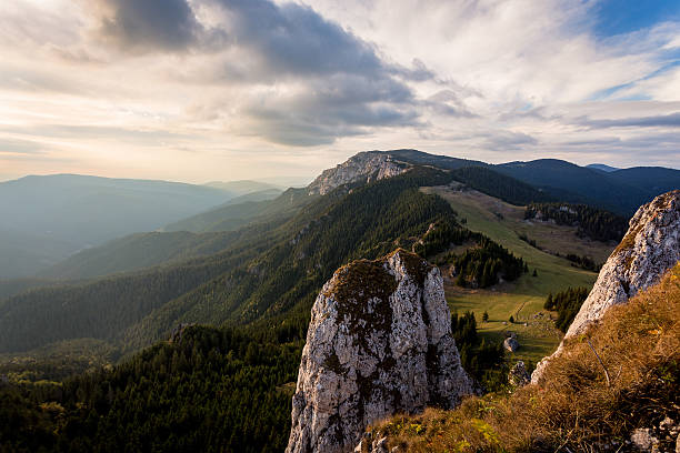 istock Beautiful landscape with sunset and cloudy sky in the mountains. 610963752