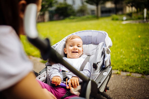istock Mom and daughter in park 610965550