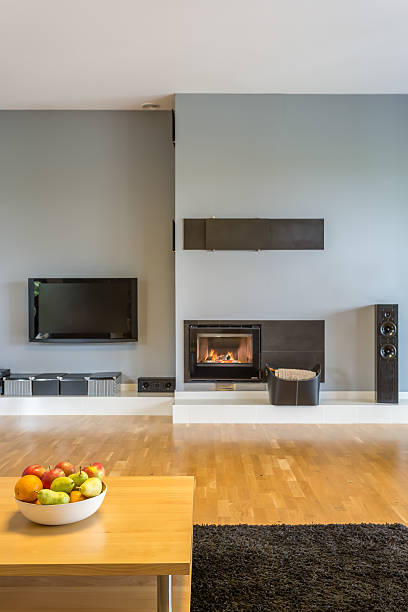istock Tv living room with fireplace idea 610966086