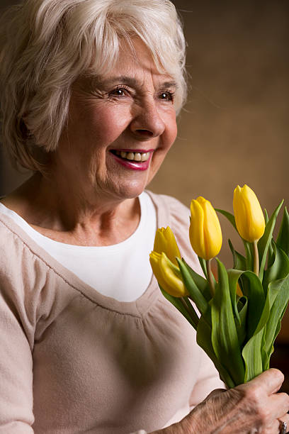istock An old woman with grey hair 610967034