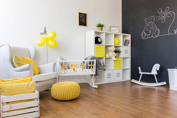 istock Yellow decorations in baby room 610967286