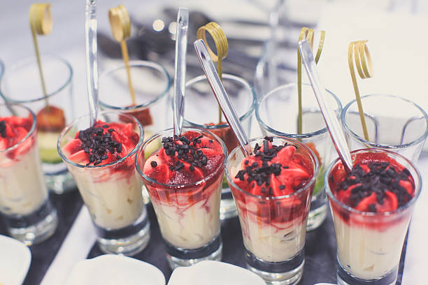 istock Beautifully decorated catering banquet table with different food snacks appetizers 610969808