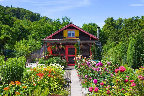 Garden house Beautiful garden house. Summer garden. cottage stock pictures, royalty-free photos & images