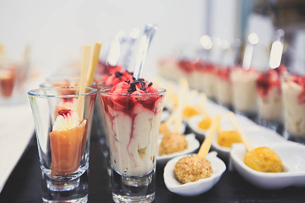 istock Beautifully decorated catering banquet table with different food snacks appetizers 610969850