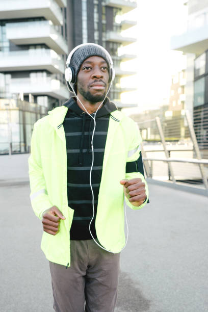 istock Cheerful Man Running Outdoors In The Early Morning 610971202