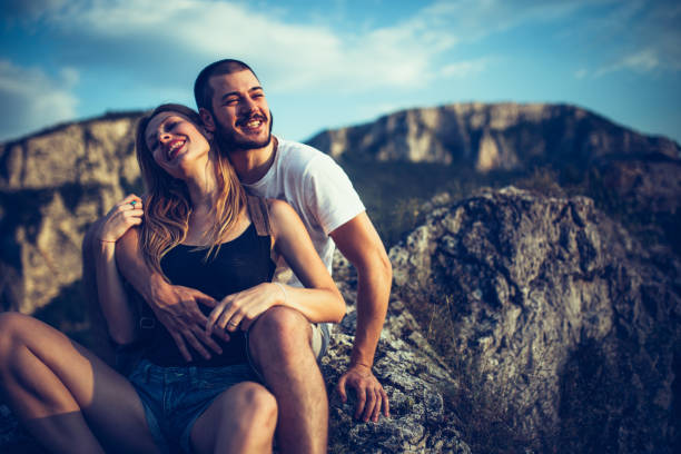 istock Happy couple on mountain 610971602