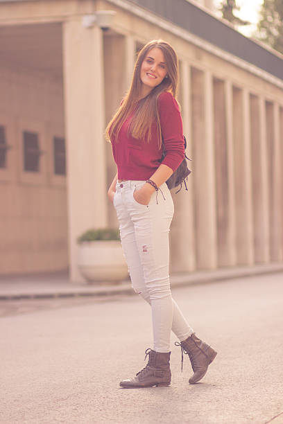 istock Sunny beautiful day outdoors young girl 20s posing 610972630