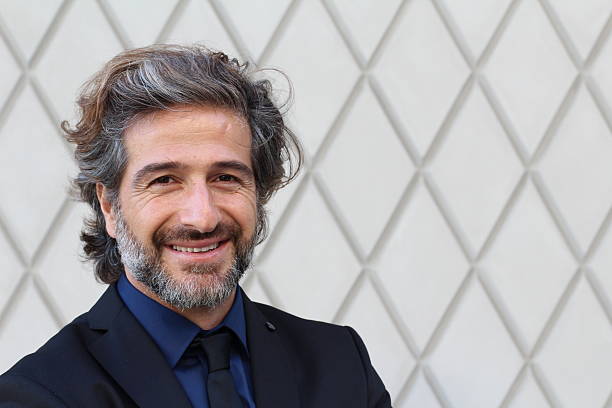 istock Portrait of an elegant CEO smiling 610973444