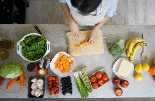 istock Close-up on a woman cooking at home 610973812