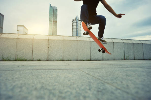istock skateboarder skateboarding at city 610974790