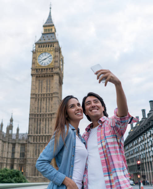 istock Tourists in London taking a selfie 610974798