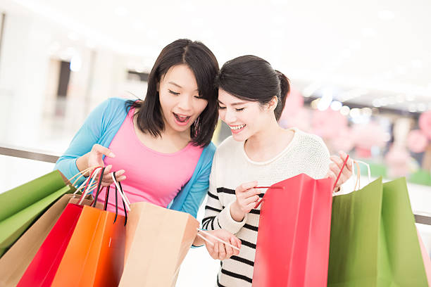 istock Happy woman shopping 610977570