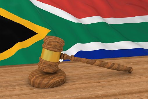 South African Law Concept - Flag of South Africa Behind Judge's Gavel 3D Illustration