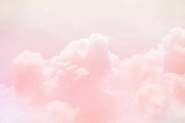 istock fantasy sky and cloud with pastel  color and grunge texture 610978736