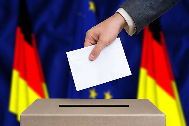 istock Referendum in Germany - voting at the ballot box 610980360