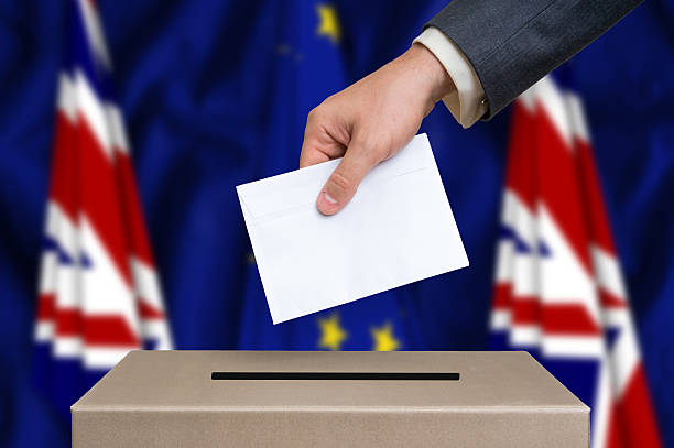 istock Referendum in Great Britain - voting at the ballot box 610980392
