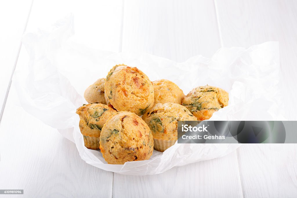 Savory cheese maffins with basil and sun-dried tomato Scone Stock Photo