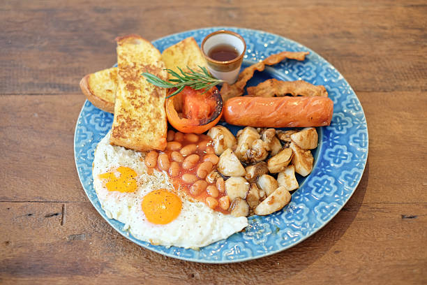 istock breakfast with egg, mushroom,  nut ,sausage and bread 610981580