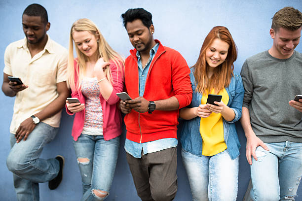 istock social media addiction people using the smartphone 610983726