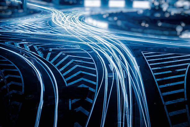 istock vehicle light trails at central district of shanghai 610984966
