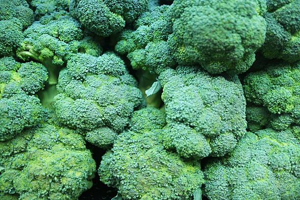 istock Healthy Green Organic Raw Broccoli Florets Ready for Cooking 610985638