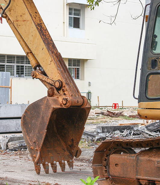 istock bucket Excavator. in work excavator destruction construction 610986340